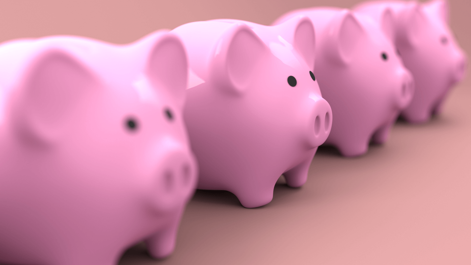 Photo of three piggy banks which contain money that you saved in college with these tips